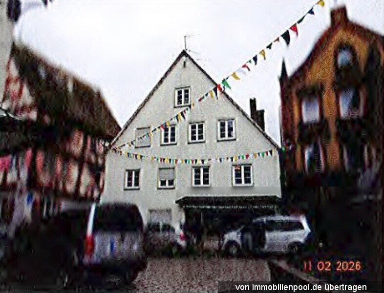 Foto 1 von 3 — Zweifamilienhaus mit integriertem Ladengeschäft