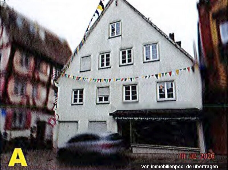 Foto 2 von 3 — Zweifamilienhaus mit integriertem Ladengeschäft