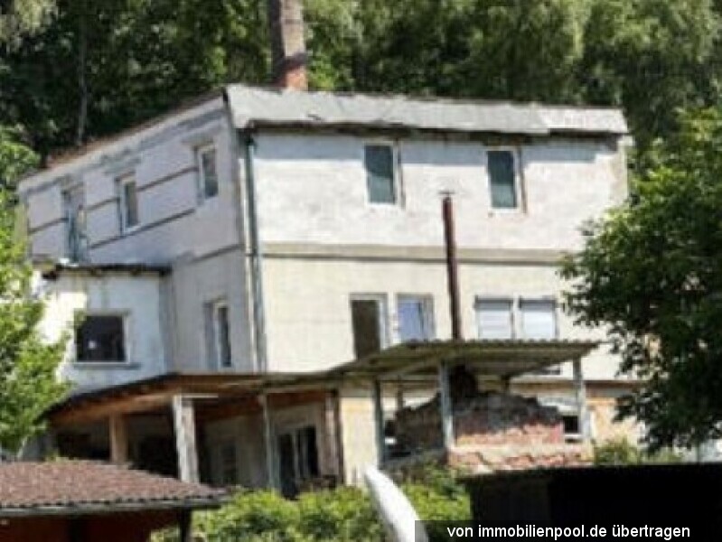 Foto 2 von 3 — Wohnhaus mit Garage, nicht fertiggestellt