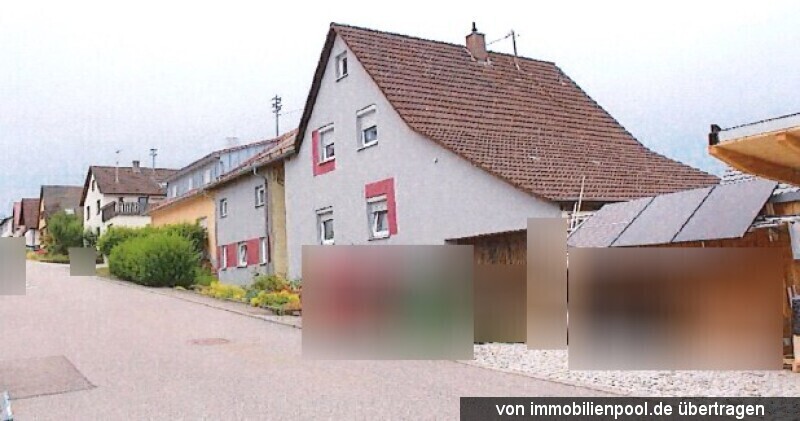 Foto 3 von 4 — Einfamilienhaus mit Garagen (1/2 Anteil)