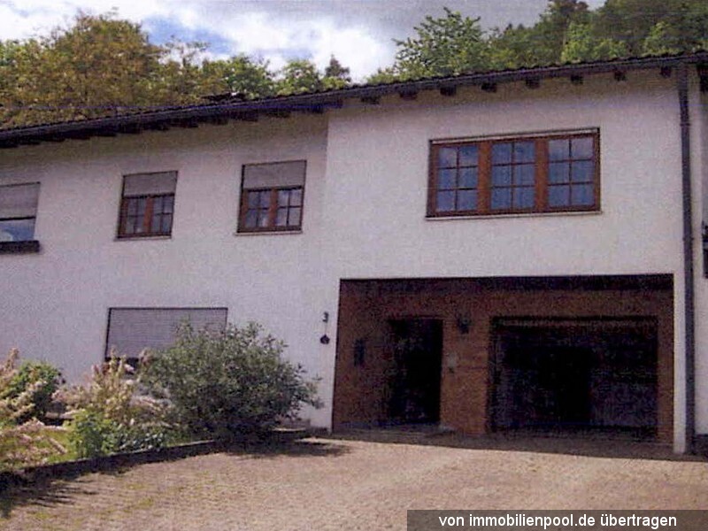Foto 1 von 4 — Einfamilienhaus mit Garage und Carport