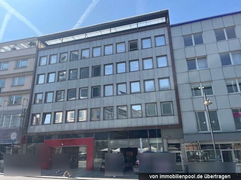 Foto 2 von 2 — Wohn- und Geschäftshaus