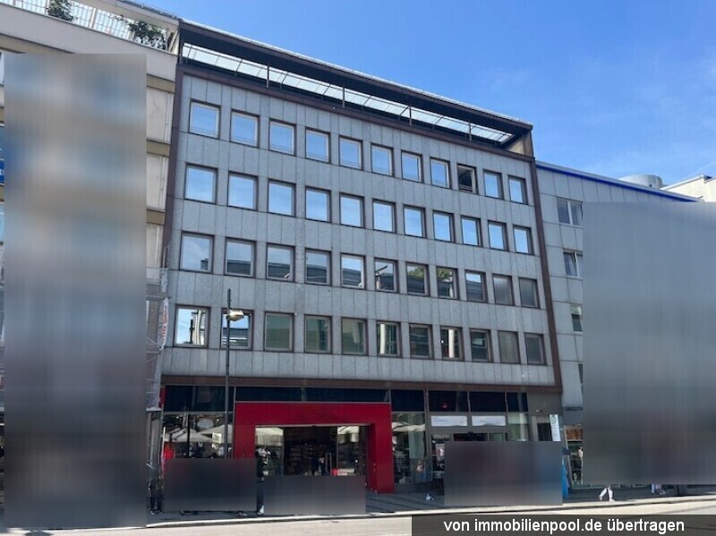 Foto 1 von 2 — Wohn- und Geschäftshaus