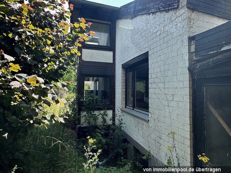 Foto 4 von 4 — Zweifamilienhaus mit Büro und Garagen