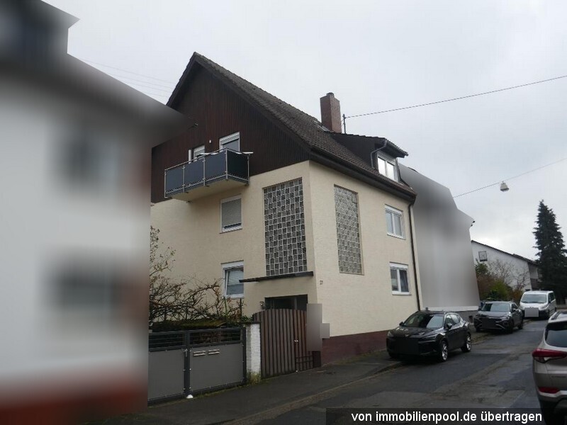Foto 1 von 3 — Wohnung im Souterrain und EG mit Kellerraum