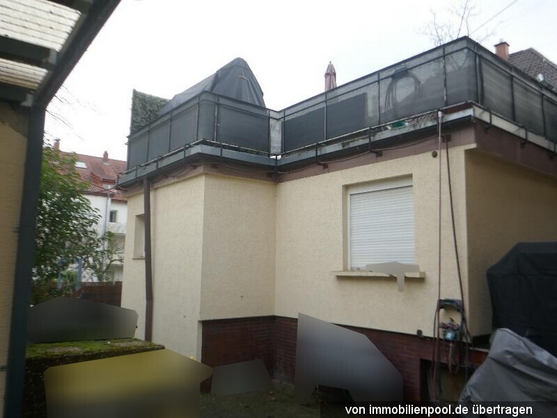 Foto 2 von 3 — Wohnung im Souterrain und EG mit Kellerraum