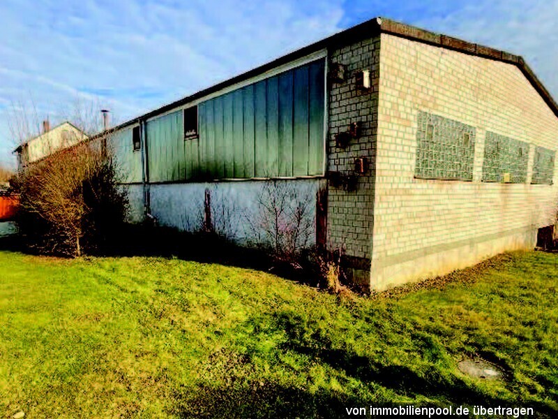 Foto 3 von 5 — Wohnhaus mit Gewerbehalle sowie mehrere Bau- und Landwirtschaftsgrun…