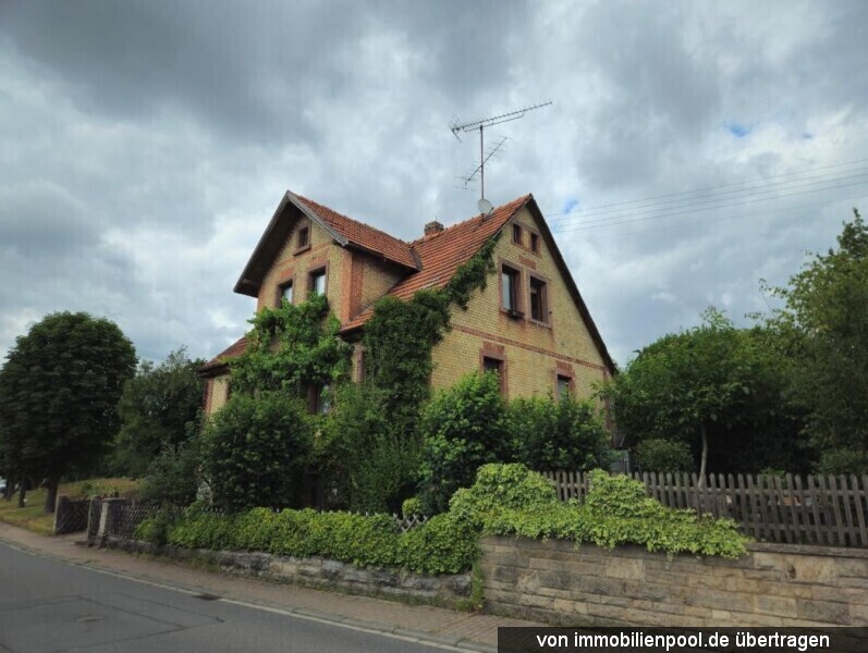 Foto 2 von 4 — Einfamilienhaus mit Scheune und Landwirtschaftsfläche