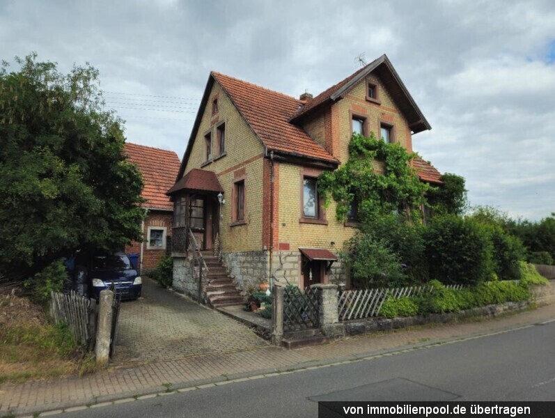 Foto 1 von 4 — Einfamilienhaus mit Scheune und Landwirtschaftsfläche