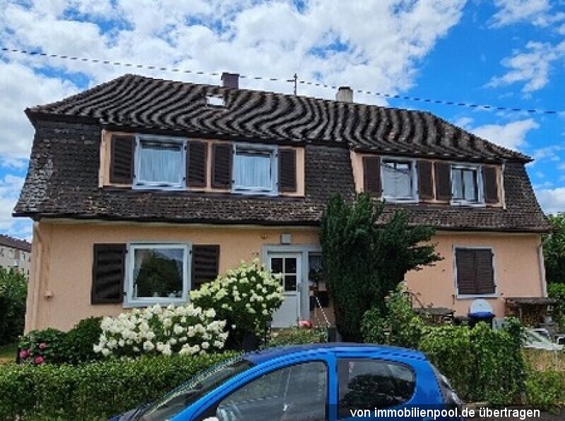 Foto 1 von 4 — Doppelhaushälfte mit Terrasse und 2 PKW-Stellplätzen