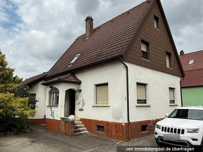 Foto 1 von 2 — Einfamilienhaus mit Garage