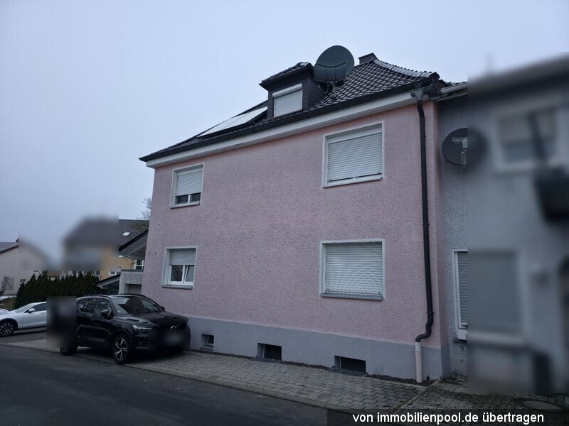 Foto 2 von 4 — Zweifamilienhaus mit Garage