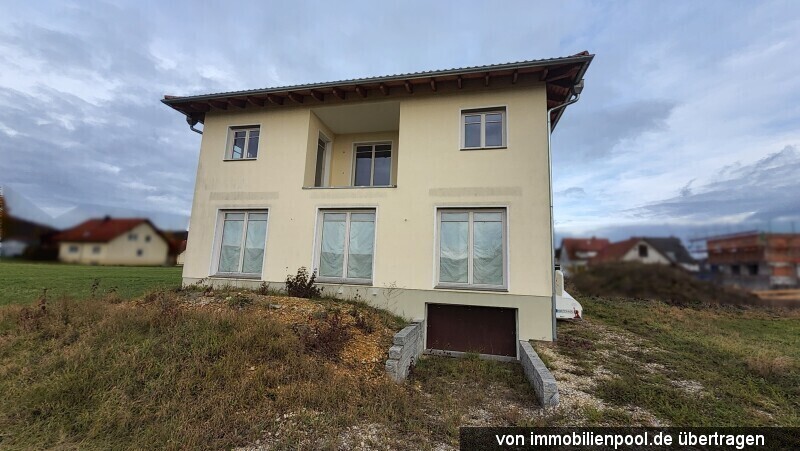 Foto 2 von 5 — Wohnhaus mit Doppelgarage