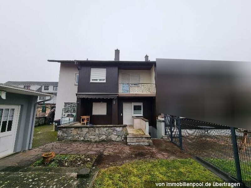 Foto 2 von 2 — Doppelhaushälfte mit Garage