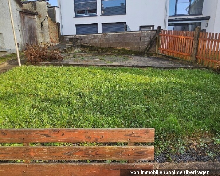 Foto 5 von 6 — Zweifamilienhaus mit Nebengebäude (ehemaliger Schopf)