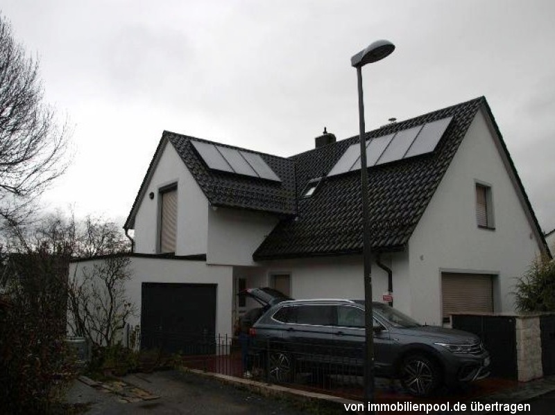 Foto 1 von 4 — Einfamilienhaus mit Garage