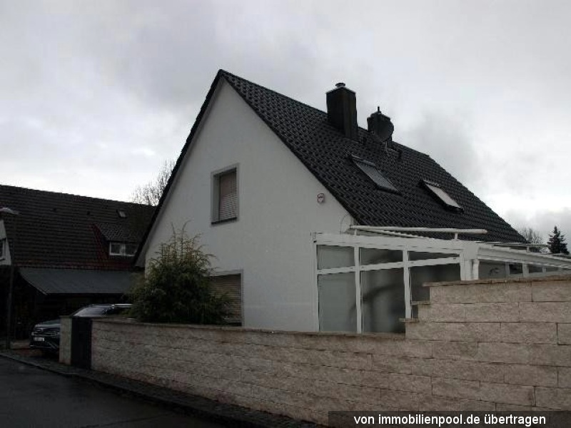 Foto 3 von 4 — Einfamilienhaus mit Garage