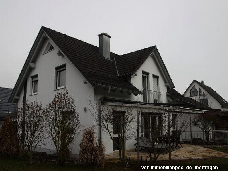 Foto 2 von 3 — Einfamilienhaus mit Doppelgarage