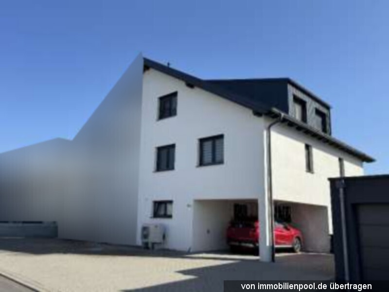 Foto 1 von 3 — Doppelhaushälfte mit Carport