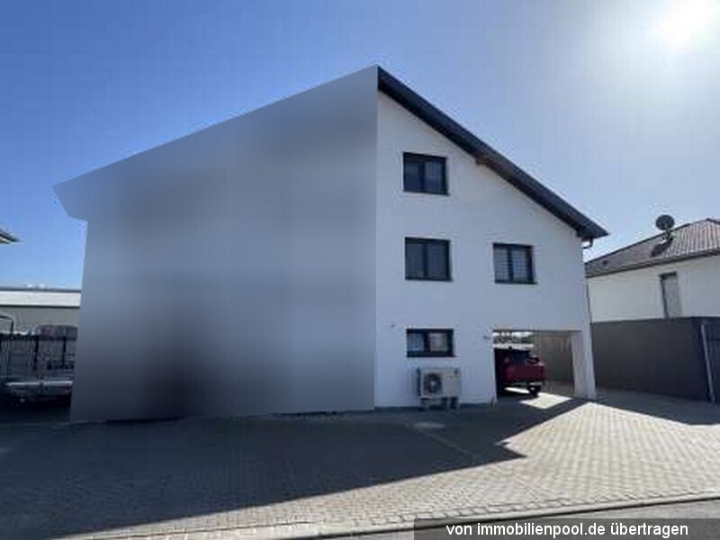 Foto 2 von 3 — Doppelhaushälfte mit Carport