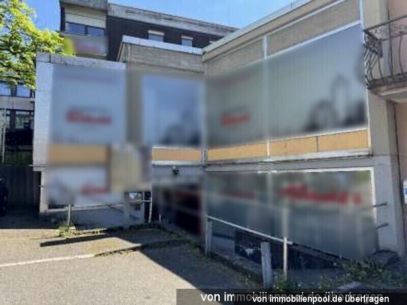 Foto 4 von 6 — Wohn- und Geschäftshaus