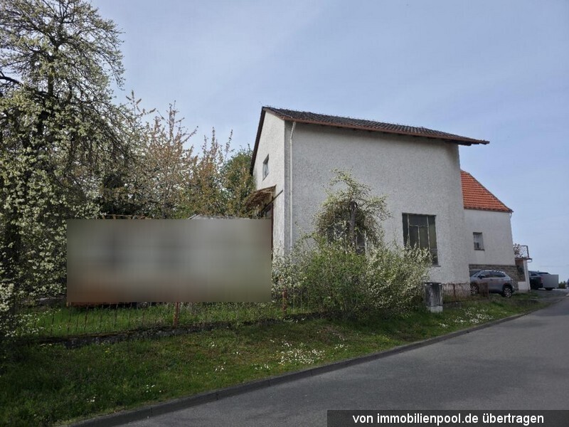 Foto 3 von 3 — Einfamilienhaus mit Halle