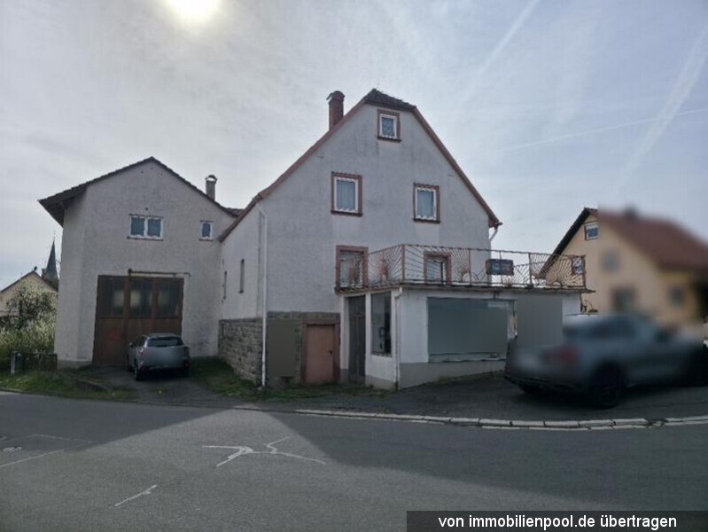Foto 1 von 3 — Einfamilienhaus mit Halle