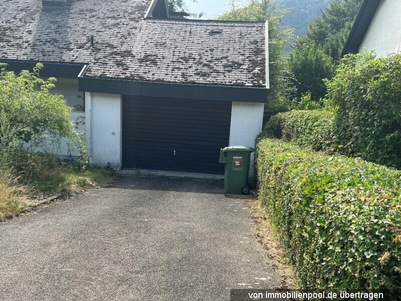 Foto 5 von 5 — Einfamilienhaus mit Garage