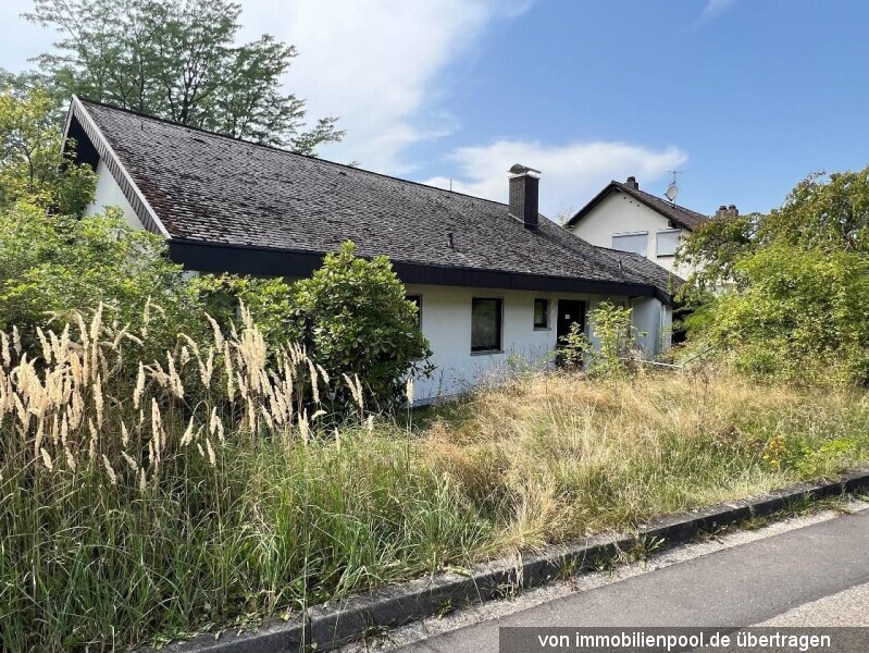 Foto 2 von 5 — Einfamilienhaus mit Garage