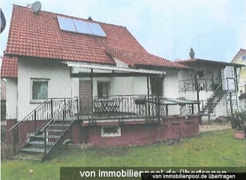 Foto 2 von 2 — Einfamilienhaus mit Einliegerwohnung