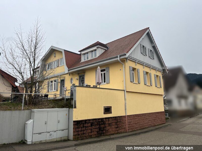 Foto 2 von 2 — Reihenmittelhaus als Wohnungseigentum sowie Keller
