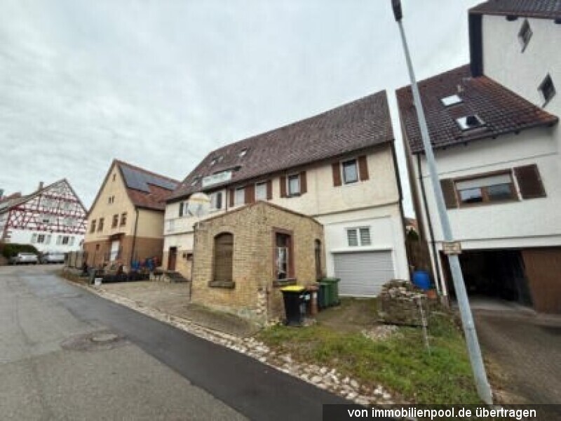 Foto 3 von 4 — Zweifamilienhaus und teilüberbautes Grundstück
