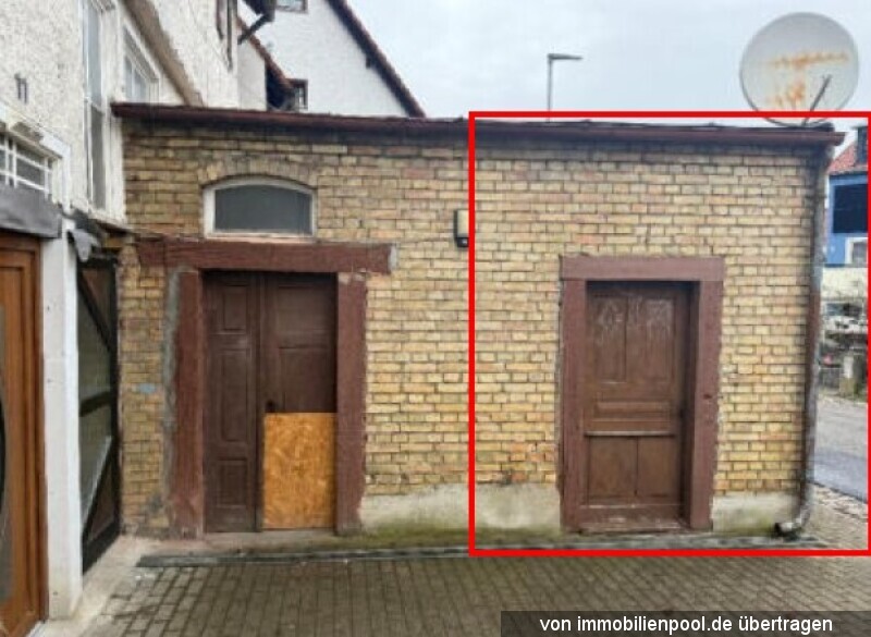 Foto 2 von 4 — Zweifamilienhaus und teilüberbautes Grundstück
