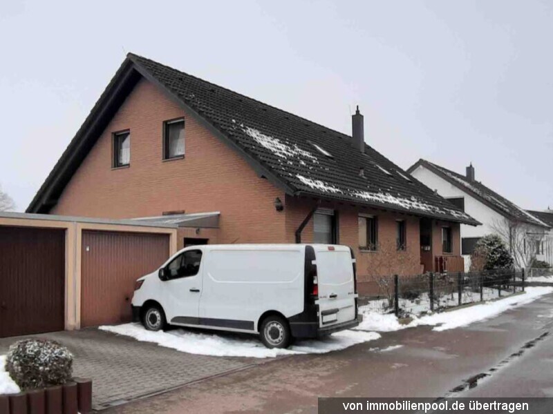 Foto 3 von 6 — Einfamilienhaus mit Doppelgarage