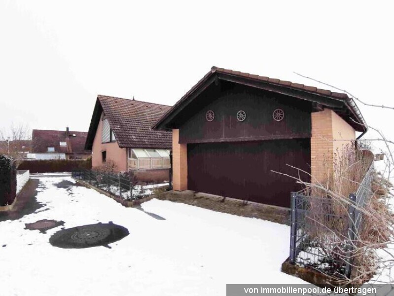 Foto 4 von 6 — Einfamilienhaus mit Doppelgarage