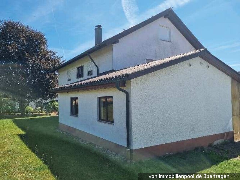 Foto 4 von 5 — Zweifamilienhaus mit Doppelgarage