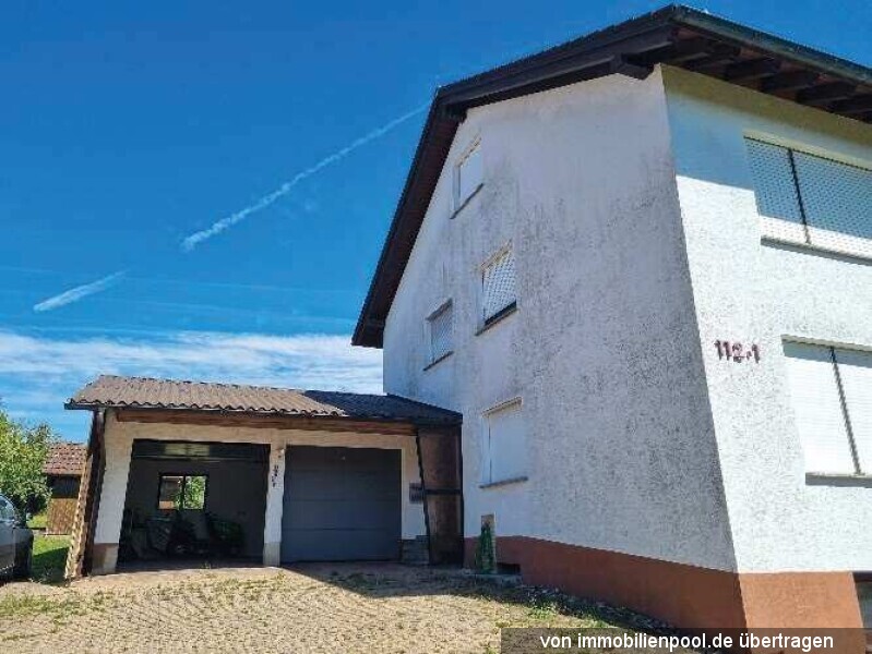 Foto 2 von 5 — Zweifamilienhaus mit Doppelgarage