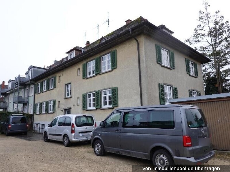 Foto 2 von 2 — Vierfamilien-Doppelhaushälfte mit 8 Garagenstellplätzen