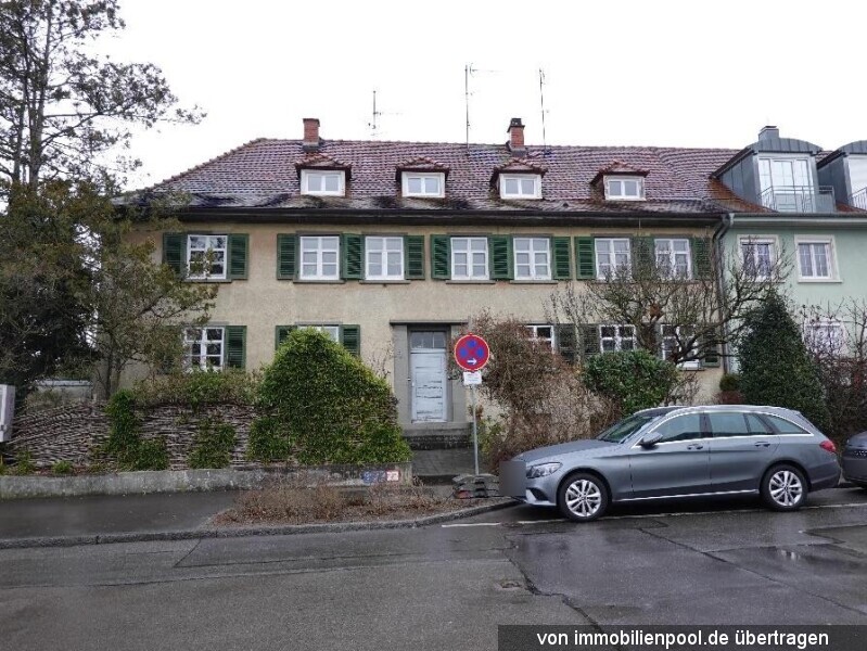 Foto 1 von 2 — Vierfamilien-Doppelhaushälfte mit 8 Garagenstellplätzen