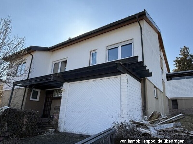 Foto 1 von 4 — Einfamilienhaus mit Garage