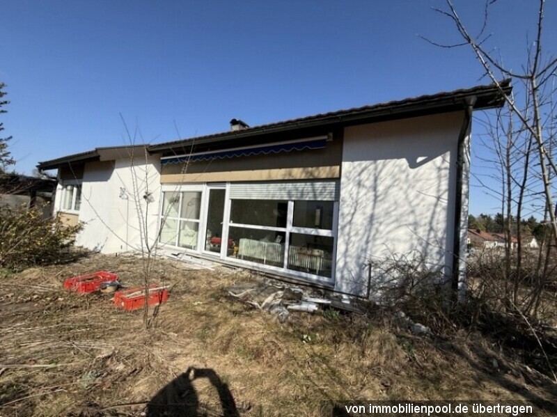 Foto 3 von 4 — Einfamilienhaus mit Garage