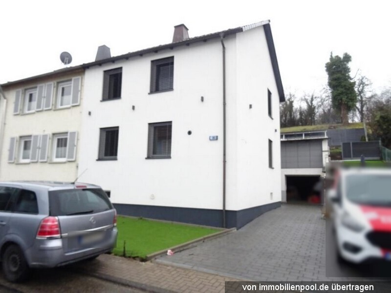Foto 1 von 2 — Doppelhaushälfte mit Garage