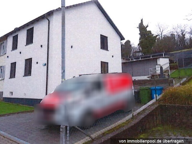 Foto 2 von 2 — Doppelhaushälfte mit Garage