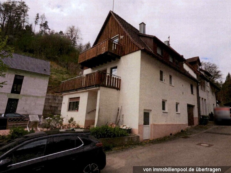 Foto 1 von 5 — Mehrfamilienhaus mit drei Wohneinheiten