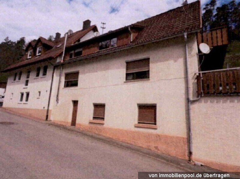 Foto 2 von 5 — Mehrfamilienhaus mit drei Wohneinheiten