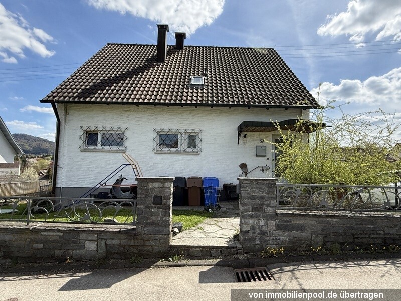 Foto 2 von 5 — Einfamilienhaus mit Einzelgarage
