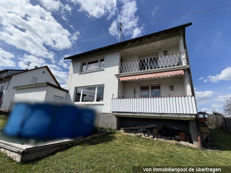 Foto 4 von 5 — Einfamilienhaus mit Einzelgarage