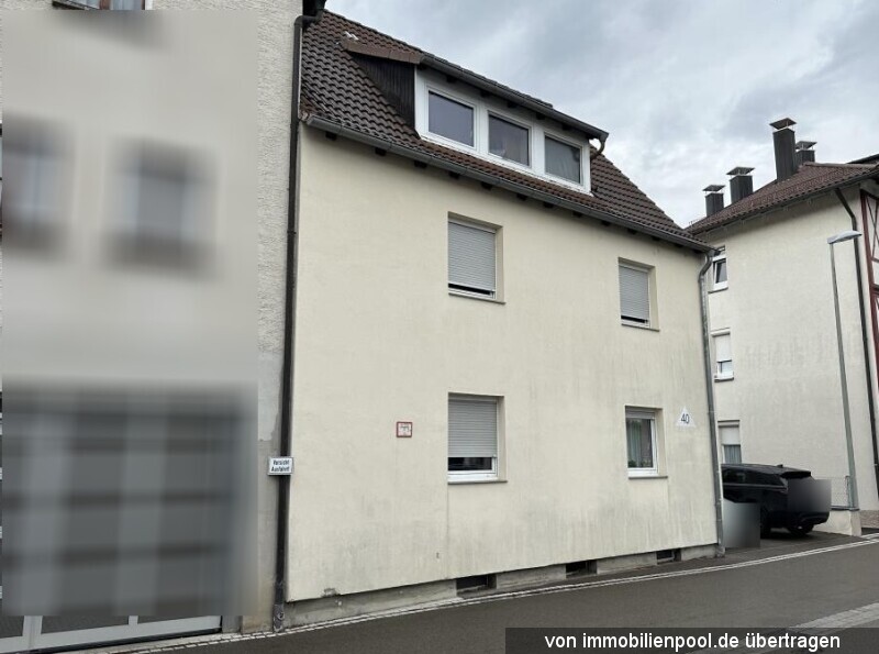 Foto 1 von 2 — Dreifamilienhaus mit Garage