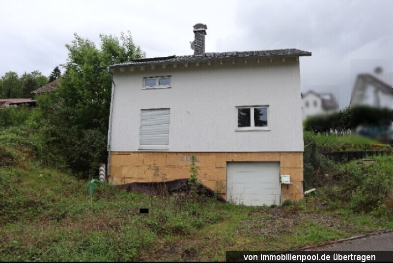 Foto 1 von 3 — Einfamilienhaus mit Garage