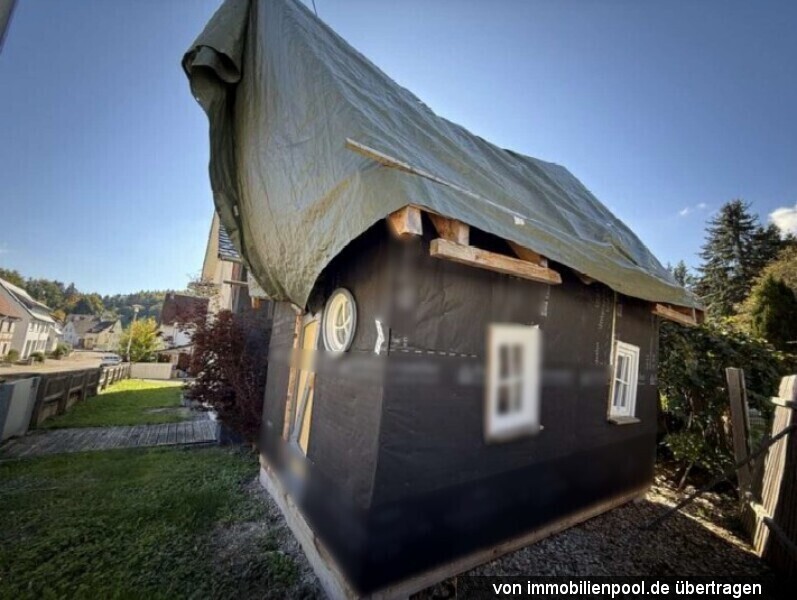 Foto 5 von 5 — Einfamilienhaus mit Doppelgarage, Carports und Anbau